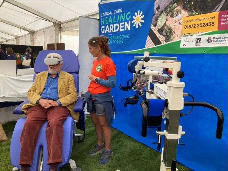 A person taking a 3d Virtual Reality tour of the Royal Cornwall Hospital's Critical Care Healing Garden at the Royal Cornwall Show