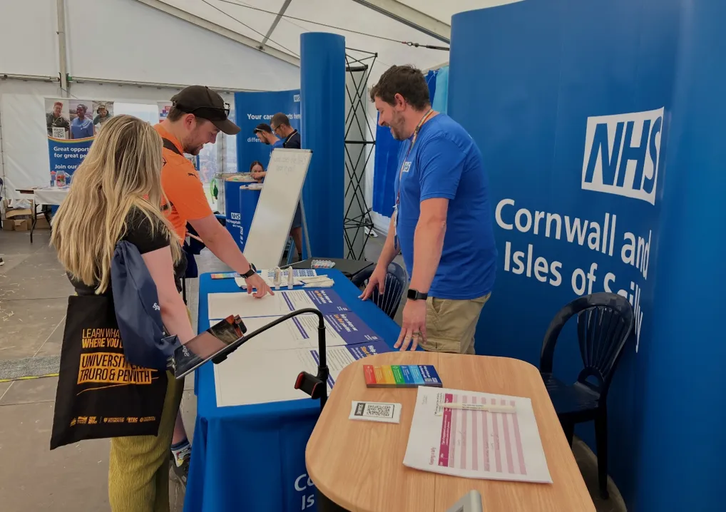 photograph depicting people at the NHS stand at the royal cornwall show